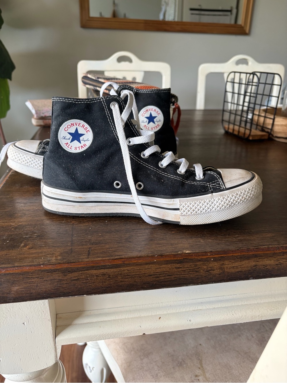 Converse Chuck Taylor’s Black and White High Top Sneakers